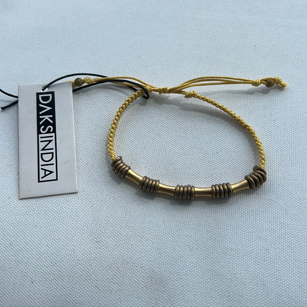DAKS INDIA brand new gold tone bracelet